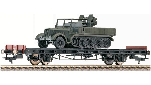 2 axle Flat car loaded with German army vehicle<br /><a href='images/pictures/Fleischmann/523610.jpg' target='_blank'>Full size image</a>